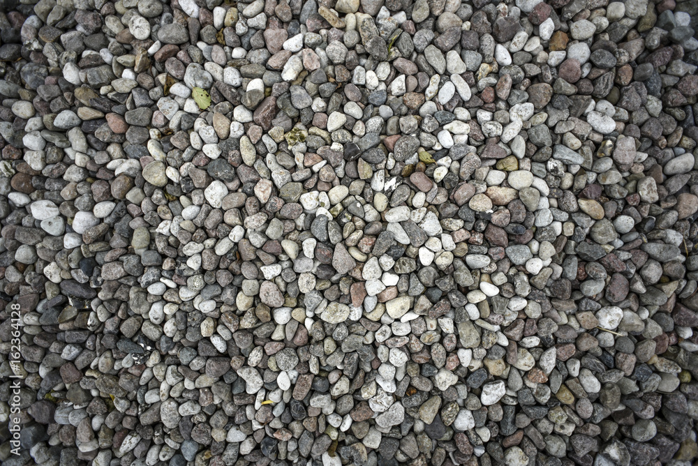 Textures of little white stone rocks on a floor. Textures of little white stone rocks on a floor.