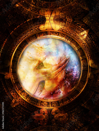 Ancient Mayan Calendar and woman hand in cosmic space. computer collage