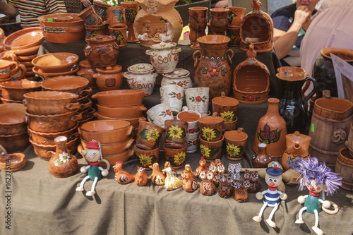 Ceramics and toy sold at medieval fair.