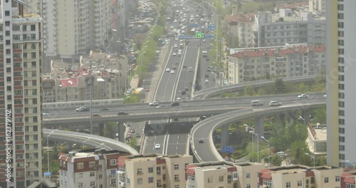 4k urban city busy traffic jams,QingDao,china.highway street & business houses building,air pollution.
