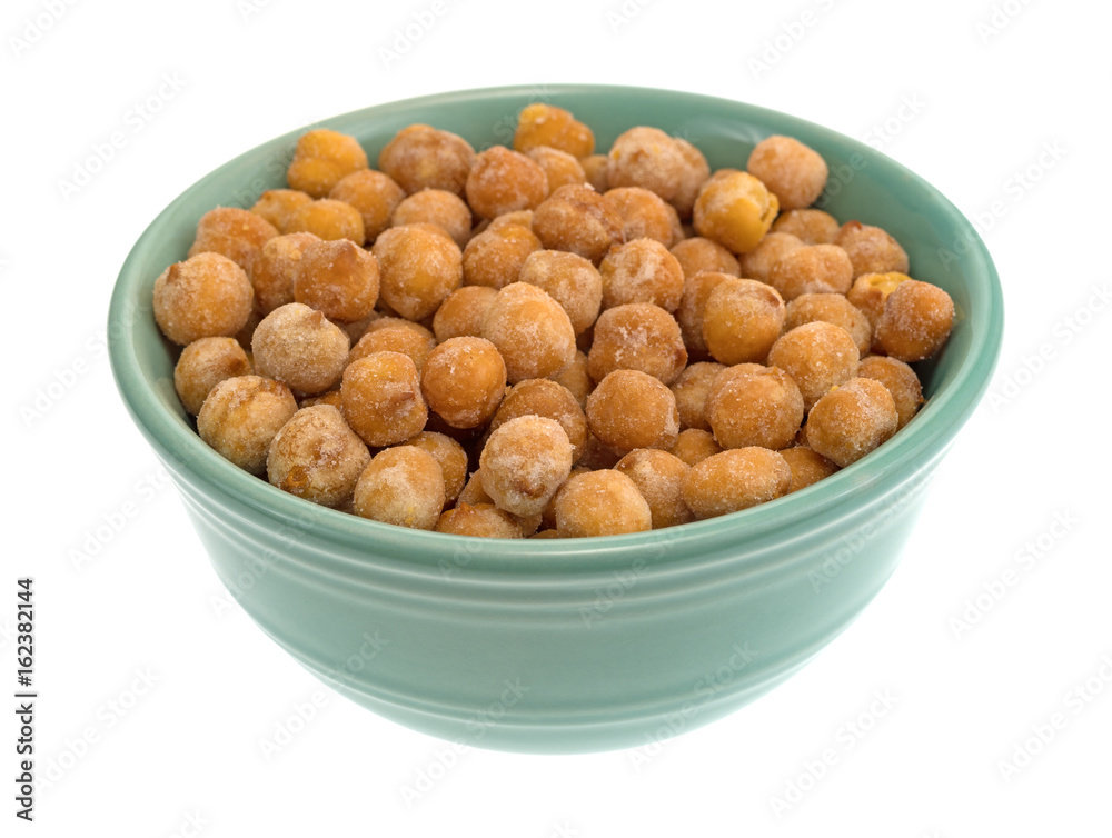 Serving of honey roasted chickpeas in a small bowl isolated on a white background. Serving of honey roasted chickpeas in a small bowl isolated on a white background.