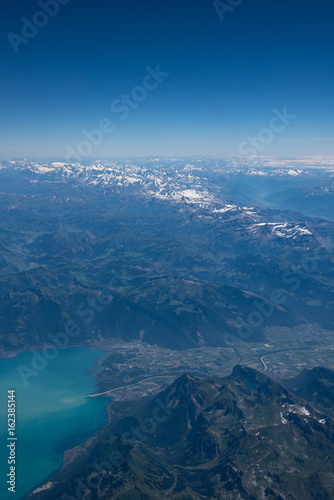 Aerial view of the alps in summer shot from a plane