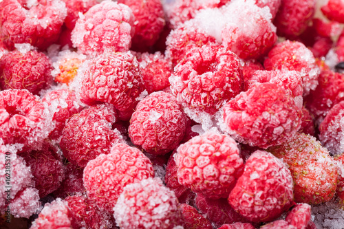 Many frozen berries for natural background. Selective focus