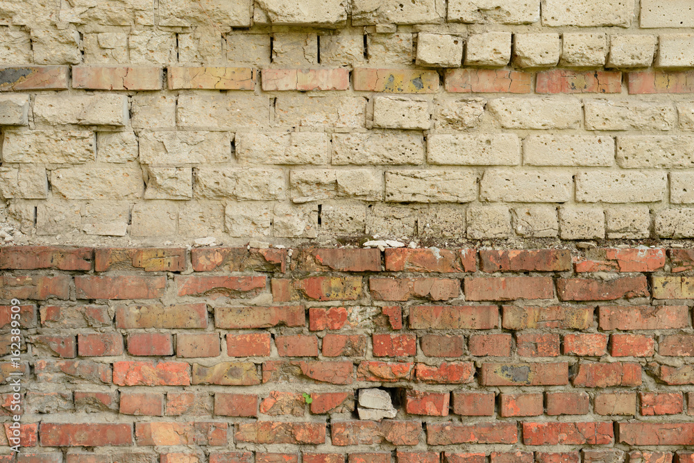 Fototapeta premium Brick texture with scratches and cracks