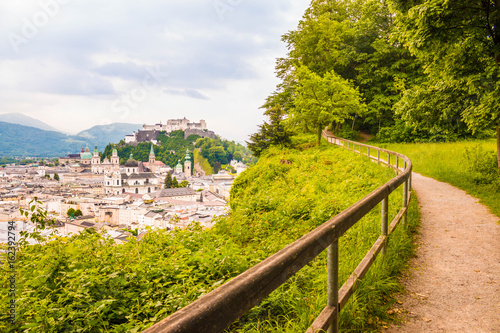 View of  Salzburg castle (Festung Hohensalzburg) and old town from a walking path along Monchsberg. Beautiful view of Salzburg, Austria.