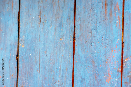 Texture background of old wooden boards painted in blue color © bearok