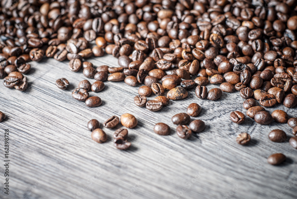 Coffee beans concept on wooden table background. Coffee beans concept on wooden table background.
