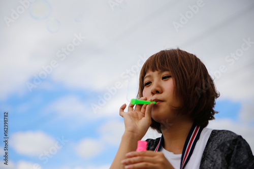 japanese young woman soap bubble