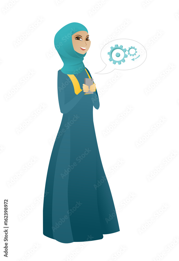 Muslim business woman holding a mobile phone. Muslim business woman holding a mobile phone.