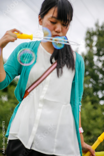 japanese young woman soap bubble
