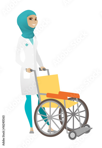Muslim female doctor pushing wheelchair isolated on white background.