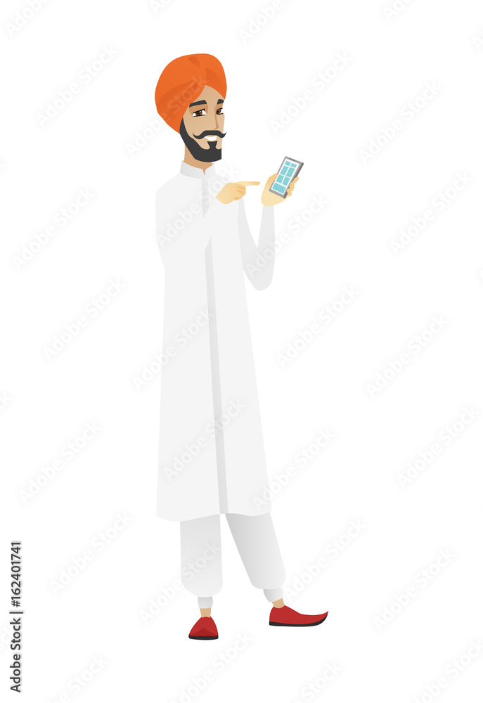 Hindu businessman holding a mobile phone. Hindu businessman holding a mobile phone.