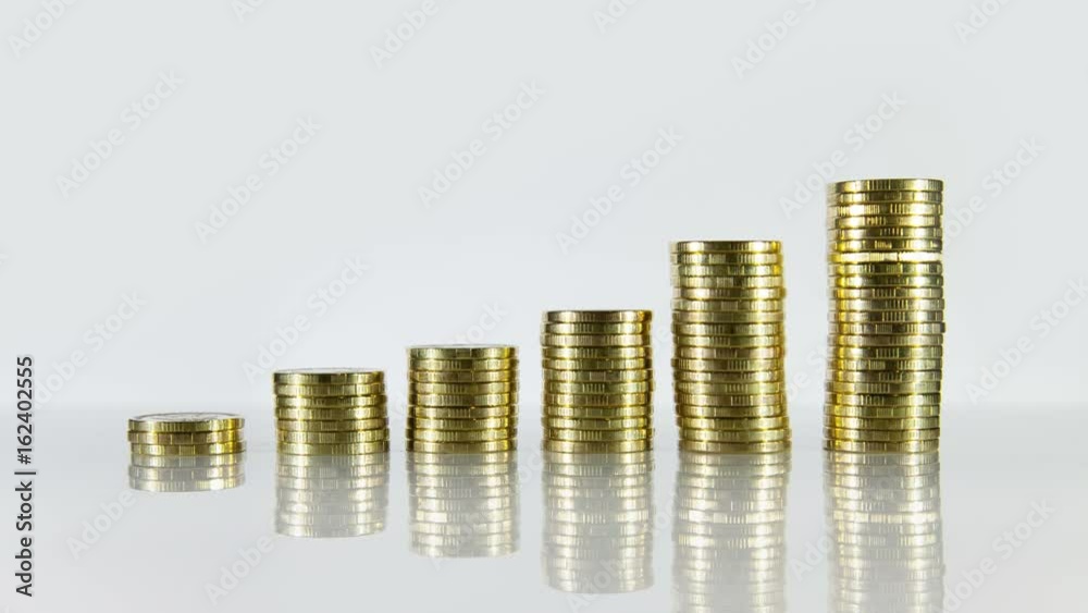 Growth of coins. Brilliant coins appear and grow. Well suited for the image of financial growth or profit. Growth of coins. Brilliant coins appear and grow. Well suited for the image of financial growth or profit.