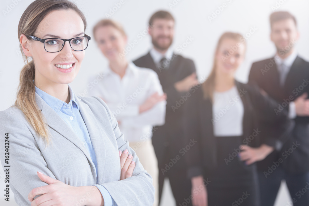 Businesswoman and her colleagues Businesswoman and her colleagues
