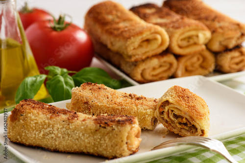 Croquettes polish style pancakes stuffed with beef. photo