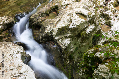 Fototapeta Naklejka Na Ścianę i Meble -  Flow of water in mountains