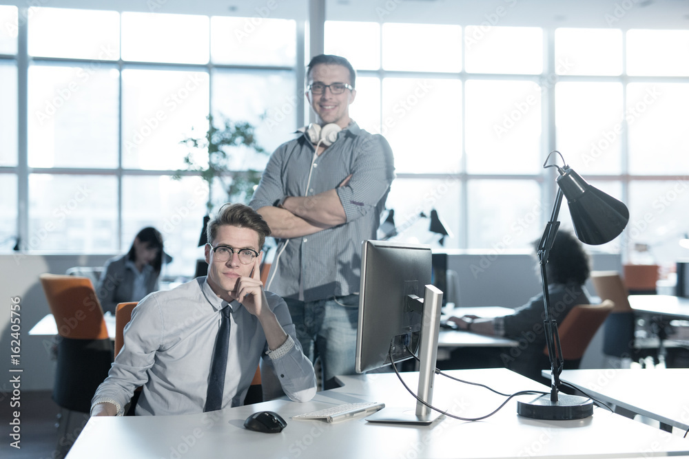 Two Business People Working With computer in office Two Business People Working With computer in office