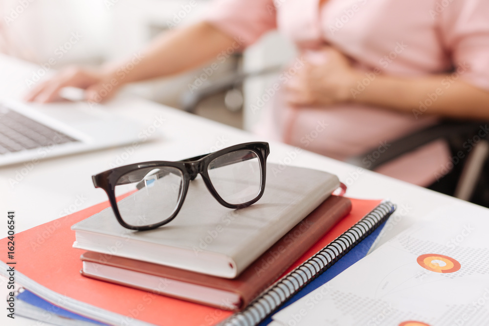 Selective focus of glasses lying on table in the office