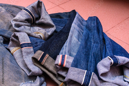 Photos a group of selvedge vintage blue jeans pants or denim isolated
