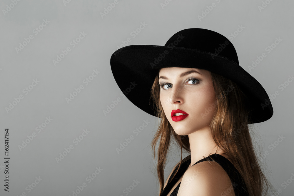 Beautiful sexy woman with red lipstick in black hat Beautiful sexy woman with red lipstick in black hat