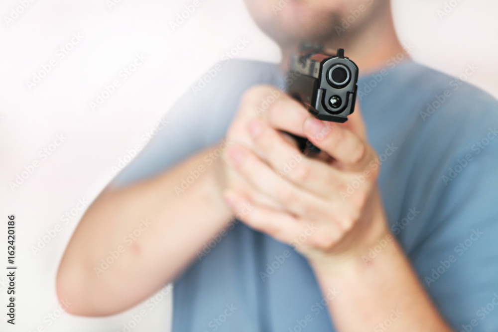 man with hand gun pistol rubber attack violence man with hand gun pistol rubber attack violence
