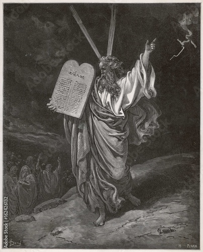 Old testament Bible scene: Moses and the ten commandments photo