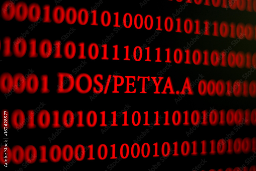 Red text on a black background. Computer virus Petya.A
