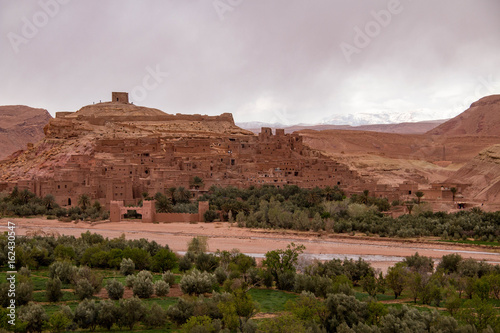 Ait Benhaddou is an ighrem  fortified village in English   located outside Ouarzazate in Morocco  Africa