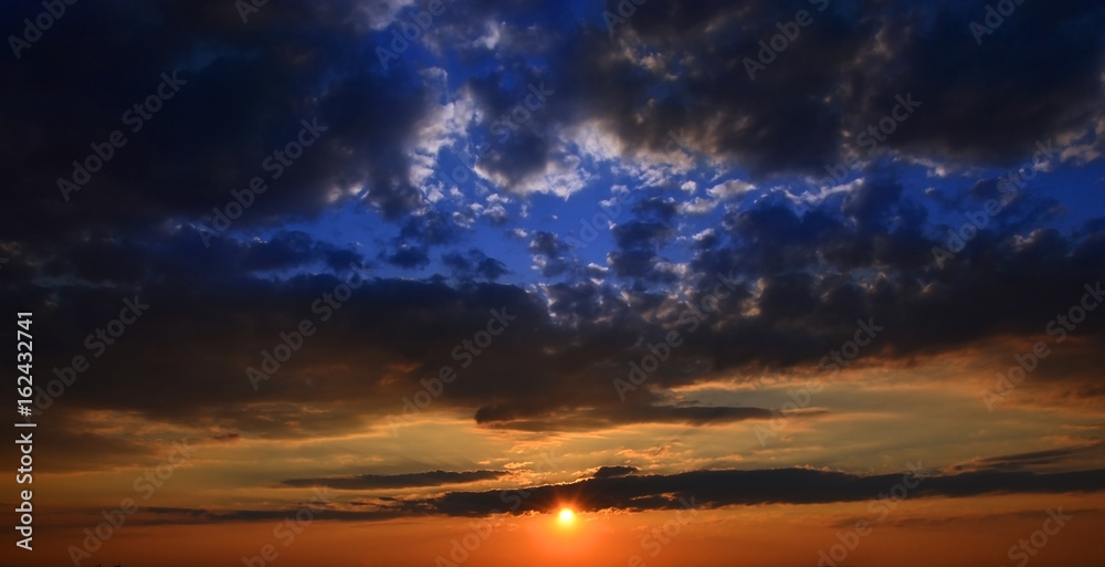 Colorful sunset with clouds, seen in Germany