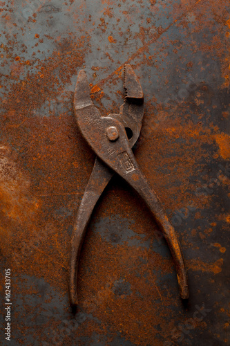 Old rusty pliers tools