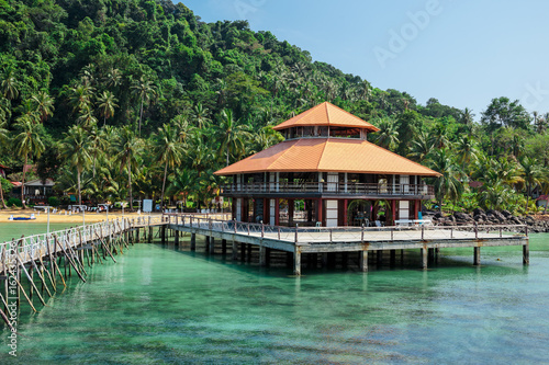 Wooden jetty on exotic beach