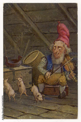 Norwegian Nisse playing the fiddle. Date: circa 1900 photo