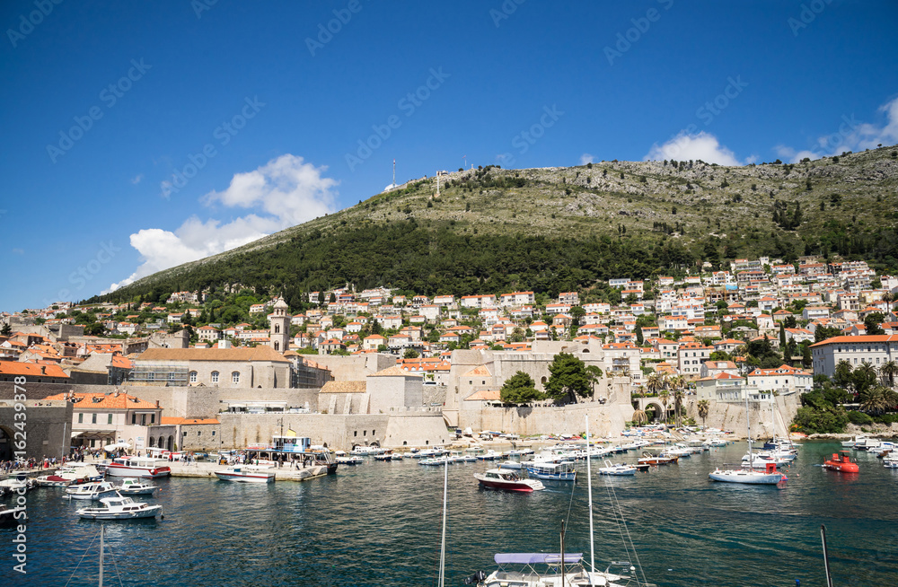 A view from the old town walls of the old harbour of Dubrovnik, Croatia.