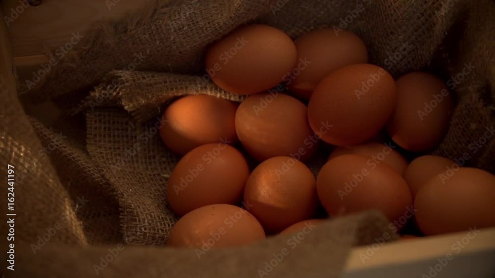 Eggs in a basket in slow motion Eggs in a basket in slow motion