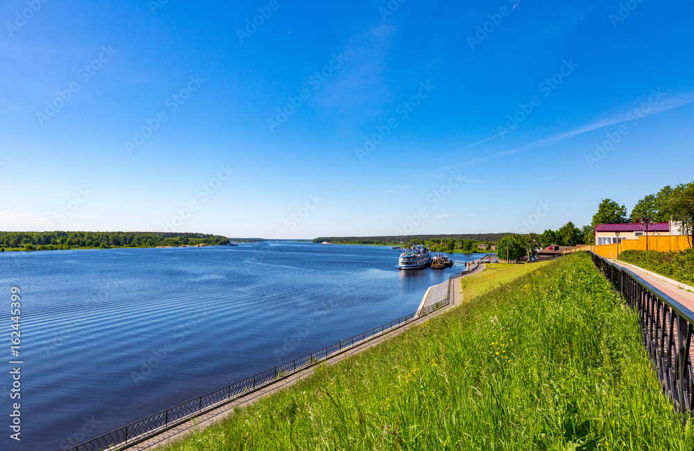 The shore of the grandiose Russian Volga river near the town of Mishkin on a summer day. Yaroslavl region

