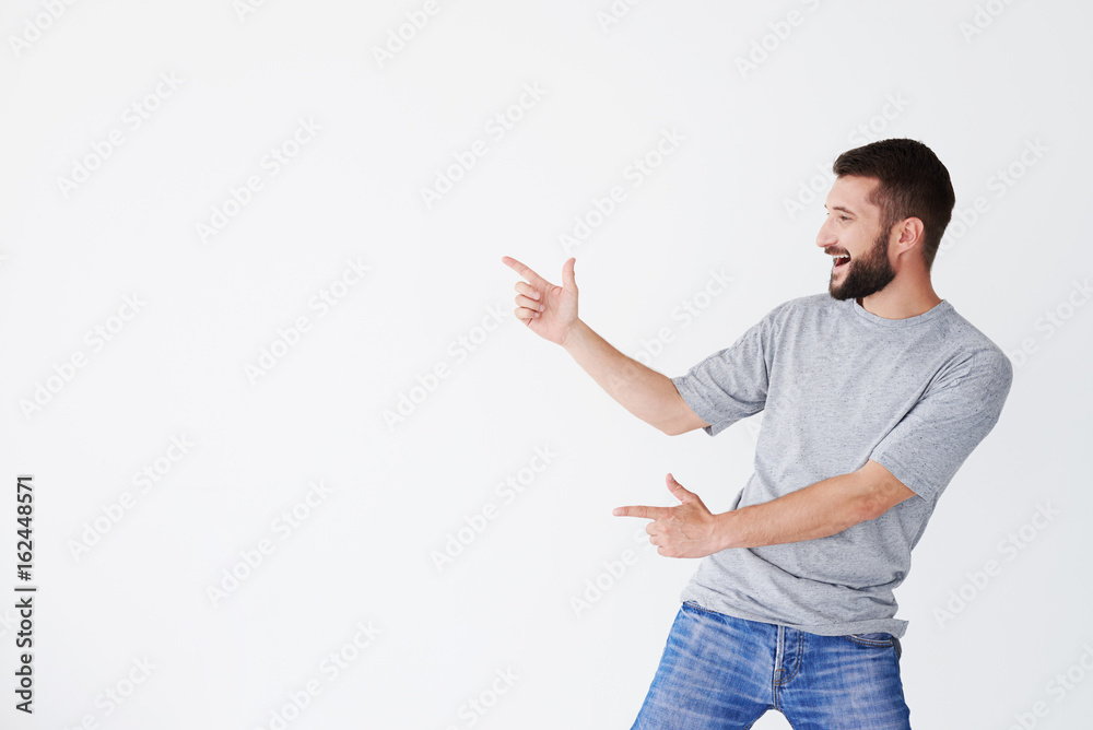 Male pointing with both hands Male pointing with both hands