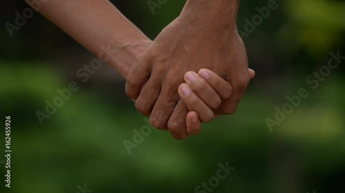 Men hold hands women.