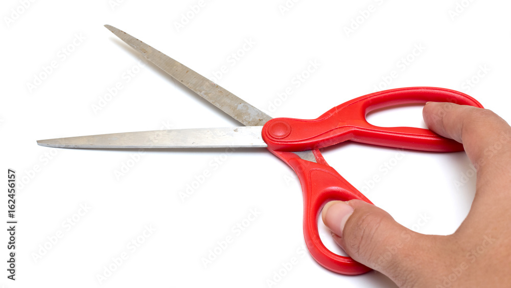 Scissors red Isolated on white background with hand Scissors red Isolated on white background with hand