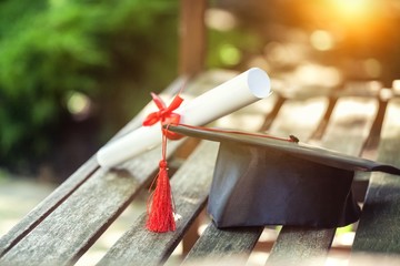 Graduation hat and diploma.
