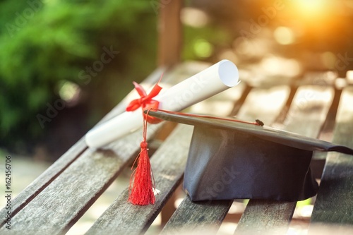 Принти на полотні Graduation hat and diploma.
