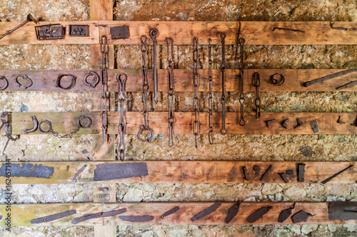 Tools used for keeping the slaves, as displayed at Cafetal la Isabelica coffee growing plantation mansion, Sierra Maestra mountain range, Cuba