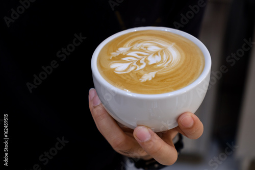 Making of latte art by barista