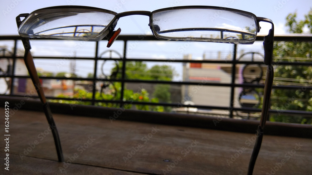 eye glasses on wooden background. eye glasses on wooden background.