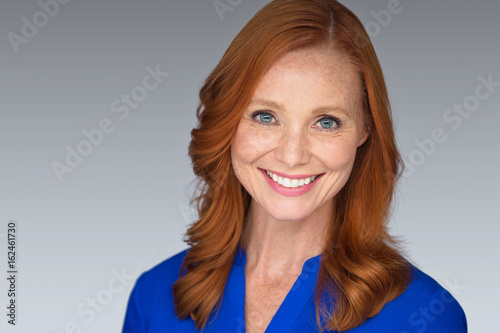 Photography Bright white teeth toothy smile from pretty middle age mature older woman after