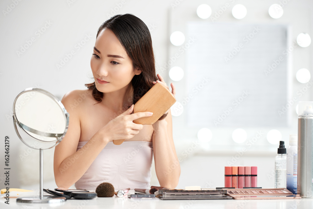 Brushing hair Brushing hair