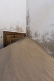 Sand cover the door