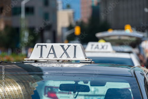 Close up of a taxi roof sign in Toronto, Canada