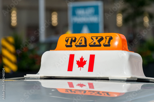 Close up of a taxi roof sign in Toronto, Canada