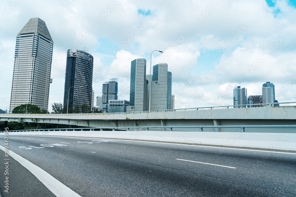 Fototapeta premium empty road with modern buildings