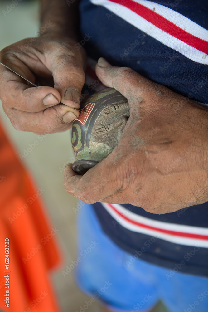 Guaitil Artisnal Village, Costa Rica - April 18, 2016: A potter shows how he makes ceramics in Guaitil Artisanal Village, Costa Rica